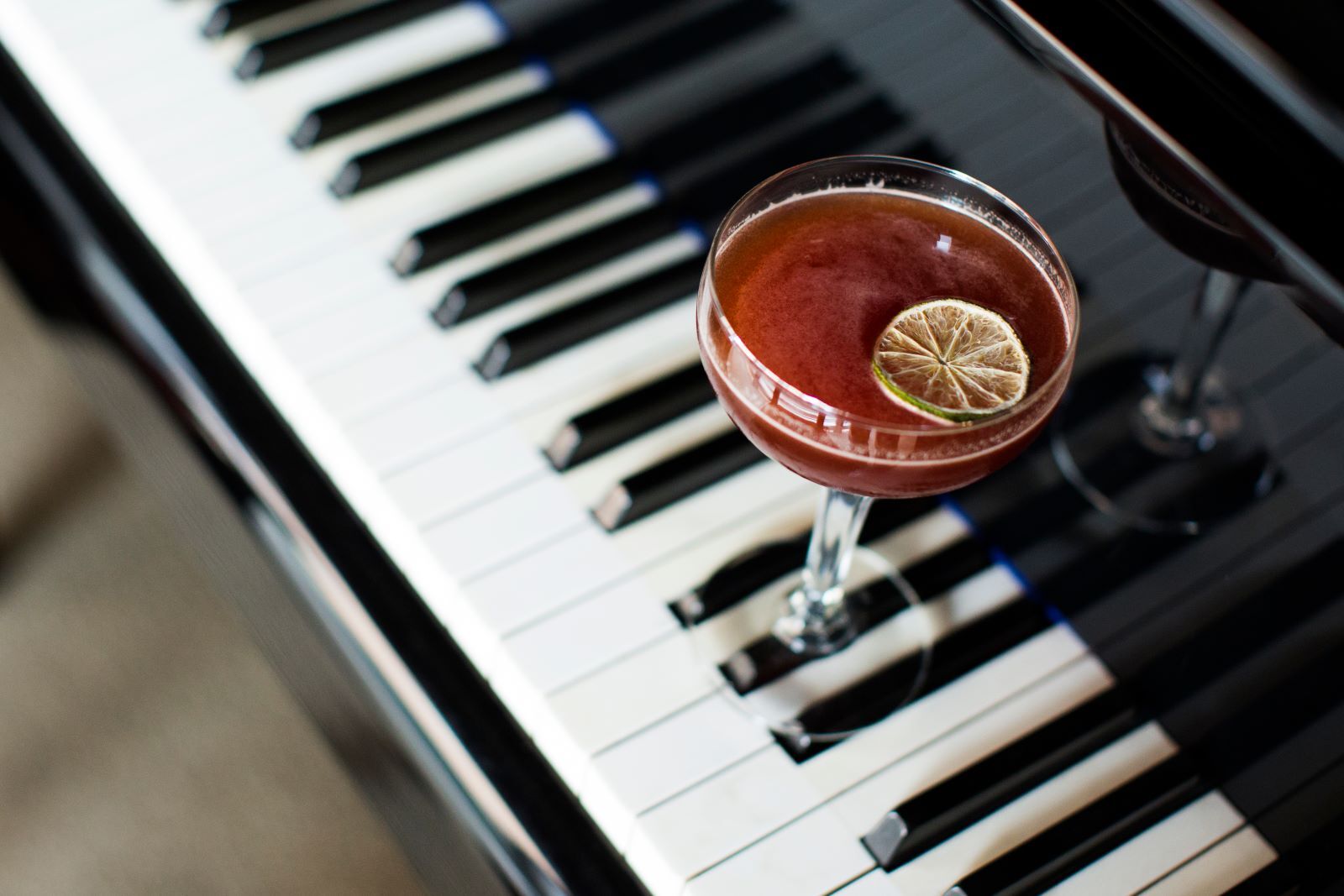 piano with a fancy cocktail